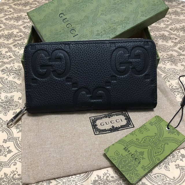 GUCCI 財布，グッチロング財布，ダブル G エンボス財布，グッチジップハンドウォレット，おしゃれ財布，トレンドレザーウォレット，シボ革ロングウォレット，大容量多カードポケット，男女兼用ラグジュアリー財布，クラシック GG 柄ハンド財布，通勤万能長財布，贈り物高級ウォレット